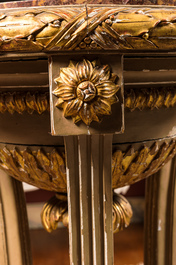 A gilt and painted wooden stand with marble top, 19th C.