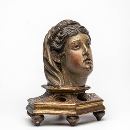 A polychromed and gilt reliquary in the shape of a lady's head, Italy, late 16th C.