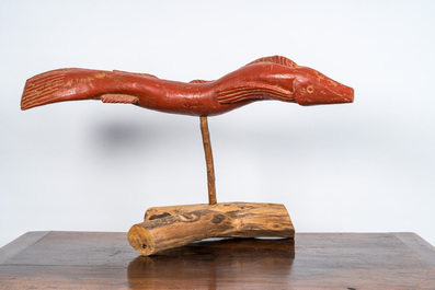 A polychromed wooden eel on foot, 20th C.