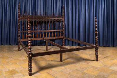 A Portuguese wooden four-poster bed, probably 19th C.