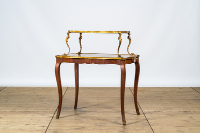 A French gilt bronze mounted mahogany &eacute;tag&egrave;re or serving table, 19/20th C.