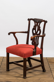 An English mahogany upholstered armchair, 19th C.