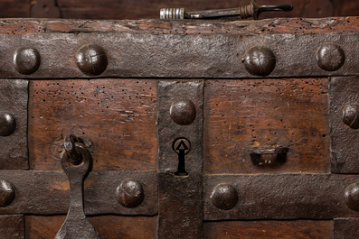 A wrought iron-mounted wooden coffer, 17th C.