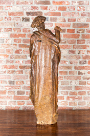 A wooden sculpture of a saint, 17th C.