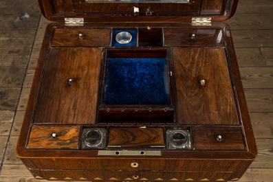 An Anglo-Indian mother-of-pearl-inlaid wooden writing table, 19/20th C.