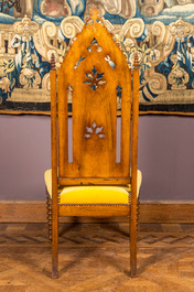 An English Victorian Gothic Revival oak high back arm chair, 19th C.