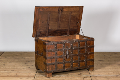 A wrought iron-mounted wooden coffer, 17th C.