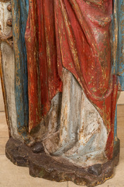 A large polychromed wooden figure of Saint Barbara, Southern Netherlands, mid 16th C.