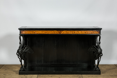 An ebonised and inlaid wooden console with swans, 19th C.