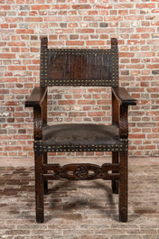A Spanish walnut chair with leather upholstery, 17th C.