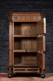 A Dutch partly ebonised oak cupboard with columns, 17th C. with later elements