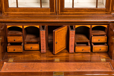 An English neoclassical mahogany marquetry breakfront bookcase, 19/20th C.