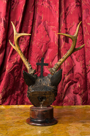 A German wooden and deer horns sculpture depicting the hunt of Saint Hubertus, 19/20th C.