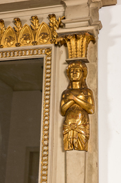 An impressive French Empire-style gray-patinated and gilt wooden mirror console with marble top, 19th C