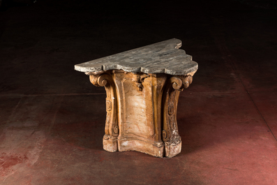 A patinated plaster console with patinated wooden top, 20th C.