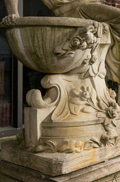 A white painted concrete garden urn flanked by the goddess Flora on matching stand, 20th C.