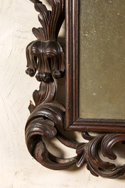 A baroque-style walnut mirror, 19th C.