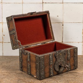 A wrought iron-mounted wooden box, 19th C.