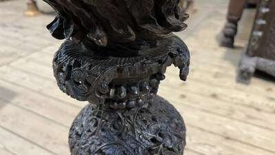 An Anglo-Indian colonial carved wooden plant stand with cobras and floral design, ca. 1900