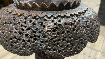 An Anglo-Indian colonial carved wooden plant stand with cobras and floral design, ca. 1900