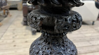 An Anglo-Indian colonial carved wooden plant stand with cobras and floral design, ca. 1900