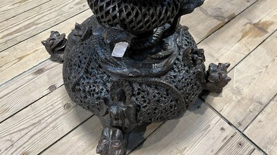 An Anglo-Indian colonial carved wooden plant stand with cobras and floral design, ca. 1900