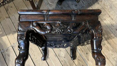 A Chinese hardwood opium table, 20th C.