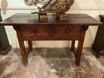 A Spanish walnut table with two drawers, 17th C.