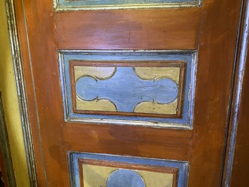 A pair of large Italian polychrome wooden two-door cupboards with coats of arms, 17th C.