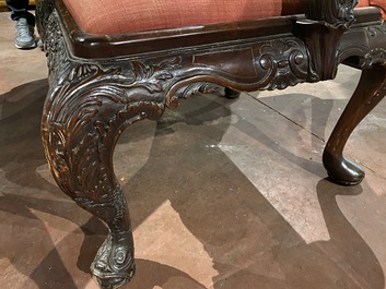 A richly decorated English Georgian style mahogany Gainsborough chair, ca. 1900