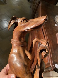 A pair of English wooden greyhounds with a shield, 19th C.