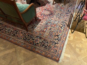 A large rectangular ornamental Heriz rug, 19/20th C.