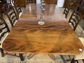 A large English mahogany dining table, 20th C.