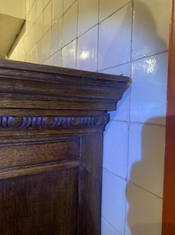 A rare German carved oak sculptural cupboard on diagonal supports with recumbent lions, Westphalia, 16th C.