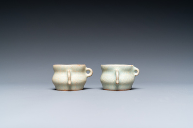 A pair of Chinese Longquan celadon bird feeders, Ming