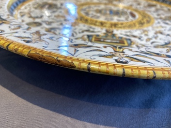 A large Italian maiolica dish with the arms of Cardinal Toschi, Deruta, dated 1609