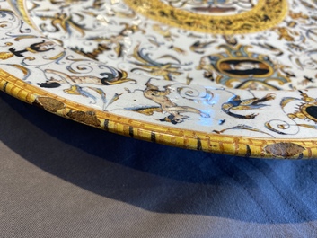 A large Italian maiolica dish with the arms of Cardinal Toschi, Deruta, dated 1609