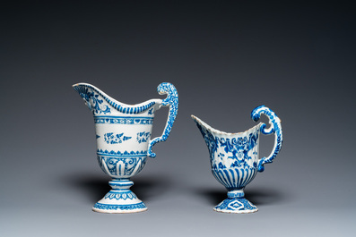 Two blue and white French faience helmet-shaped jugs, Rouen and Nevers, 18th C.