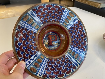 An Italian maiolica lustre-glazed dish monogrammed 'P', Gubio, workshop of Maestro Giorgio, 1st quarter 16th C.