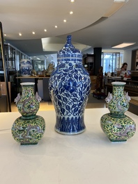 A pair of Chinese famille verte double gourd vases and a blue and white vase and cover, 19/20th C.