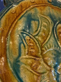 Een Chinese fahua vaas met reli&euml;fdecor van een lotus, Ming