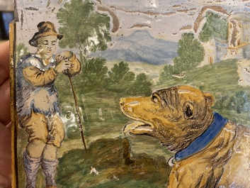 Plaque en fa&iuml;ence de Castelli polychrome figurant un berger et deux grands chiens, Italie, 18&egrave;me