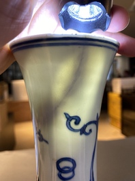 A Chinese blue and white bottle vase with a dragon on the neck, Transitional period