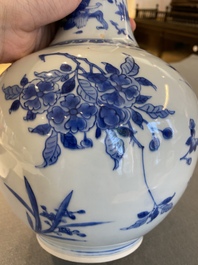 A Chinese blue and white bottle vase with a dragon on the neck, Transitional period