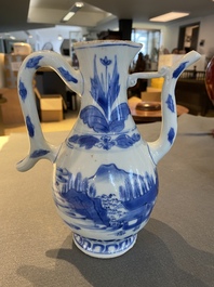 A Chinese blue and white ewer with a fisherman in a landscape, Transitional period