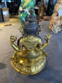 A Chinese gilt bronze figure of Avalokitesvara, Yongzheng mark and of the period