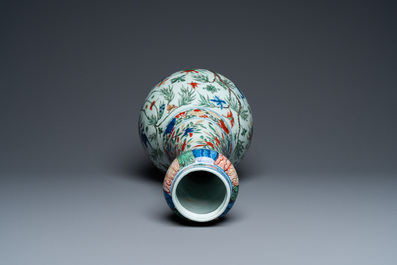 A Chinese wucai garlic-mouth bottle vase, Wanli mark and of the period