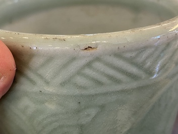 Two Chinese celadon-glazed brush pots with underglaze design, 19th C.