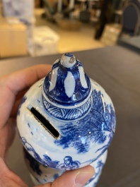 An exceptional Dutch Delft blue and white triple gourd money bank, early 18th C.