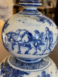 An exceptional Dutch Delft blue and white triple gourd money bank, early 18th C.